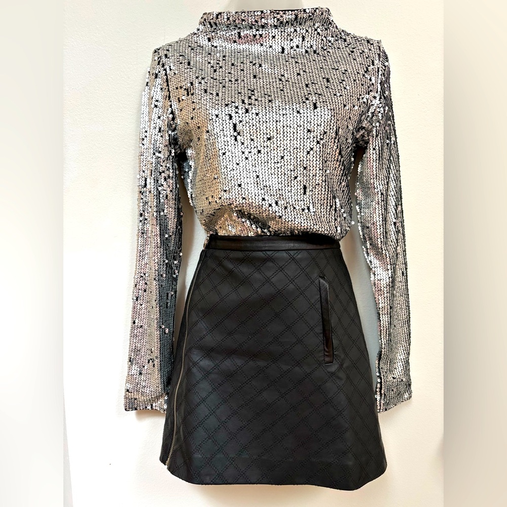 Black genuine leather mini skirt, BEBE size small